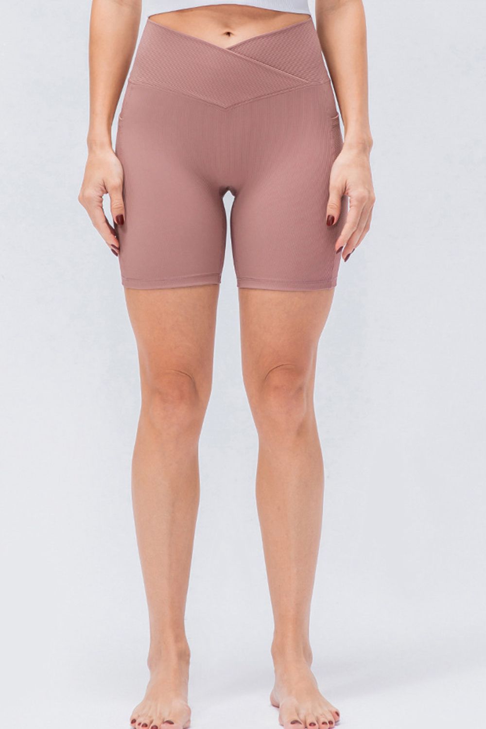 Front view of women’s high-waisted activewear shorts – breathable and stretch-fit design.