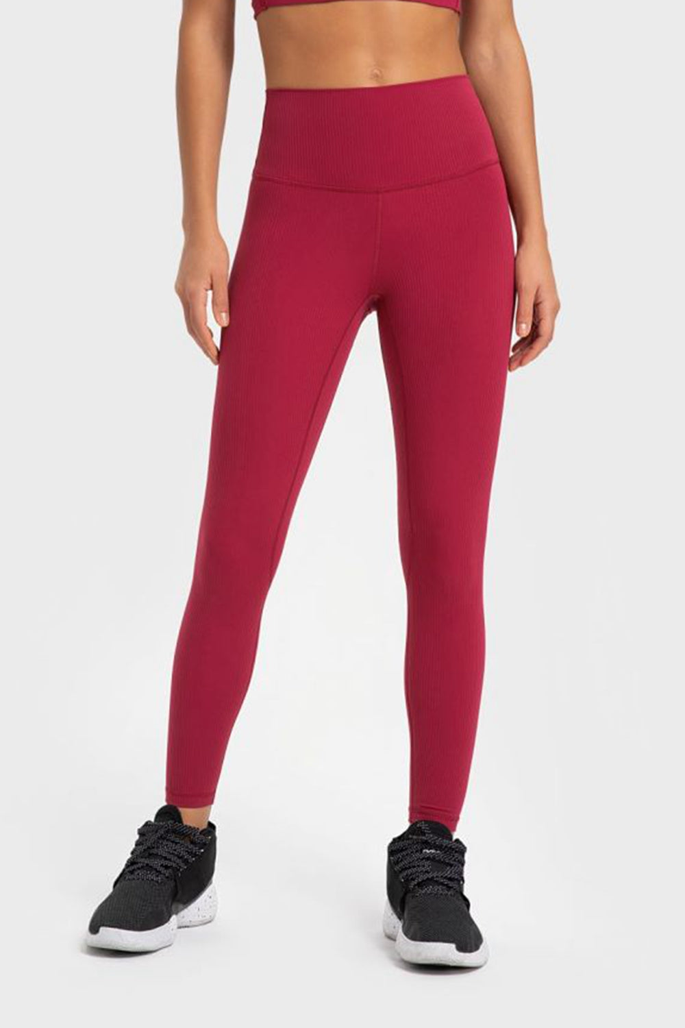 Women’s high-waisted, wide waistband leggings for yoga.