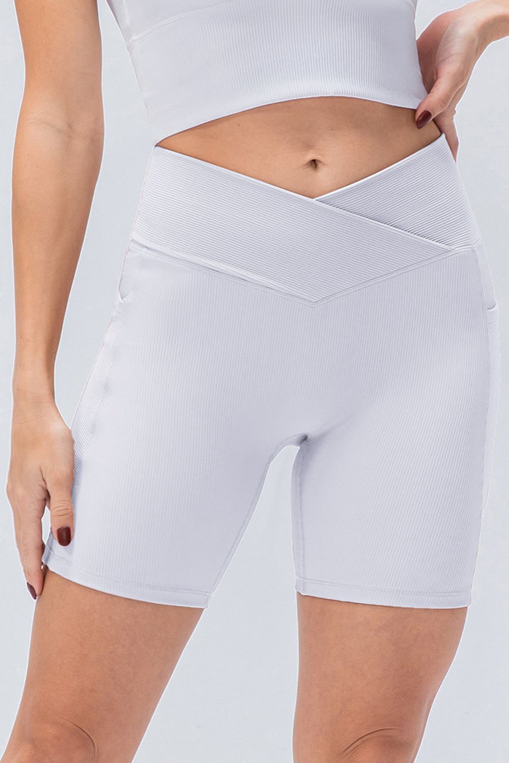 Front view of women’s high-waisted activewear shorts – breathable and stretch-fit design.