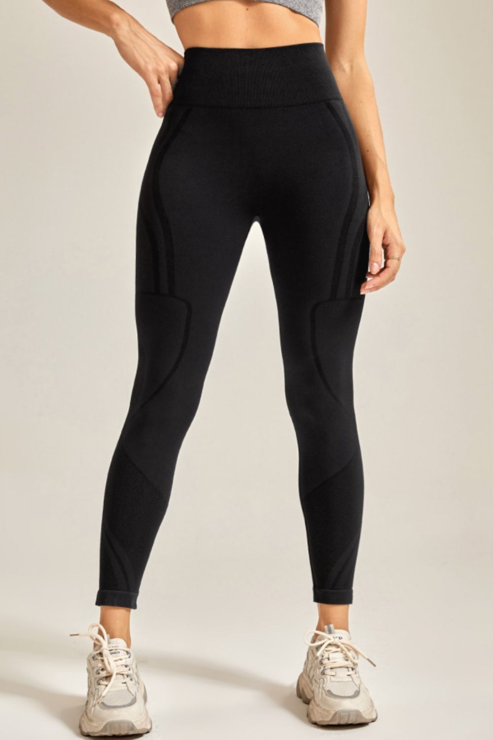 Zanneft PulseFlex slim-fit sporty active pants for women – high-stretch, second-skin leggings for studio photos.