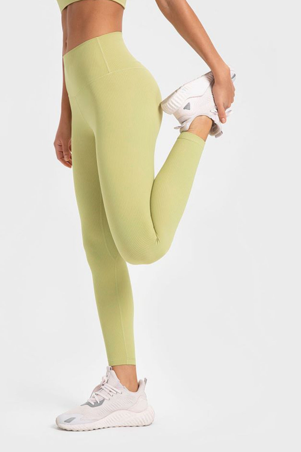 Women’s high-waisted, wide waistband leggings for yoga.