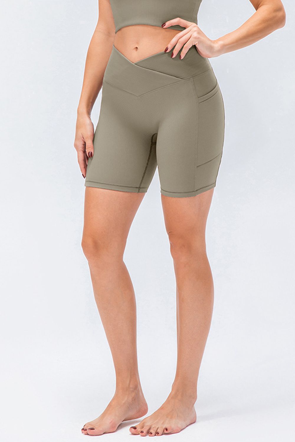 Front view of women’s high-waisted activewear shorts – breathable and stretch-fit design.