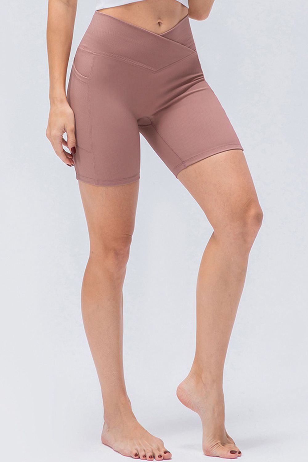 Front view of women’s high-waisted activewear shorts – breathable and stretch-fit design.