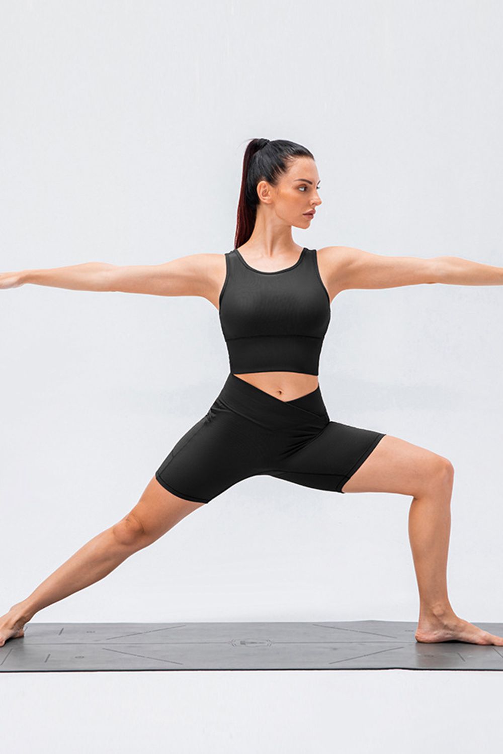 Front view of women’s high-waisted activewear shorts – breathable and stretch-fit design.