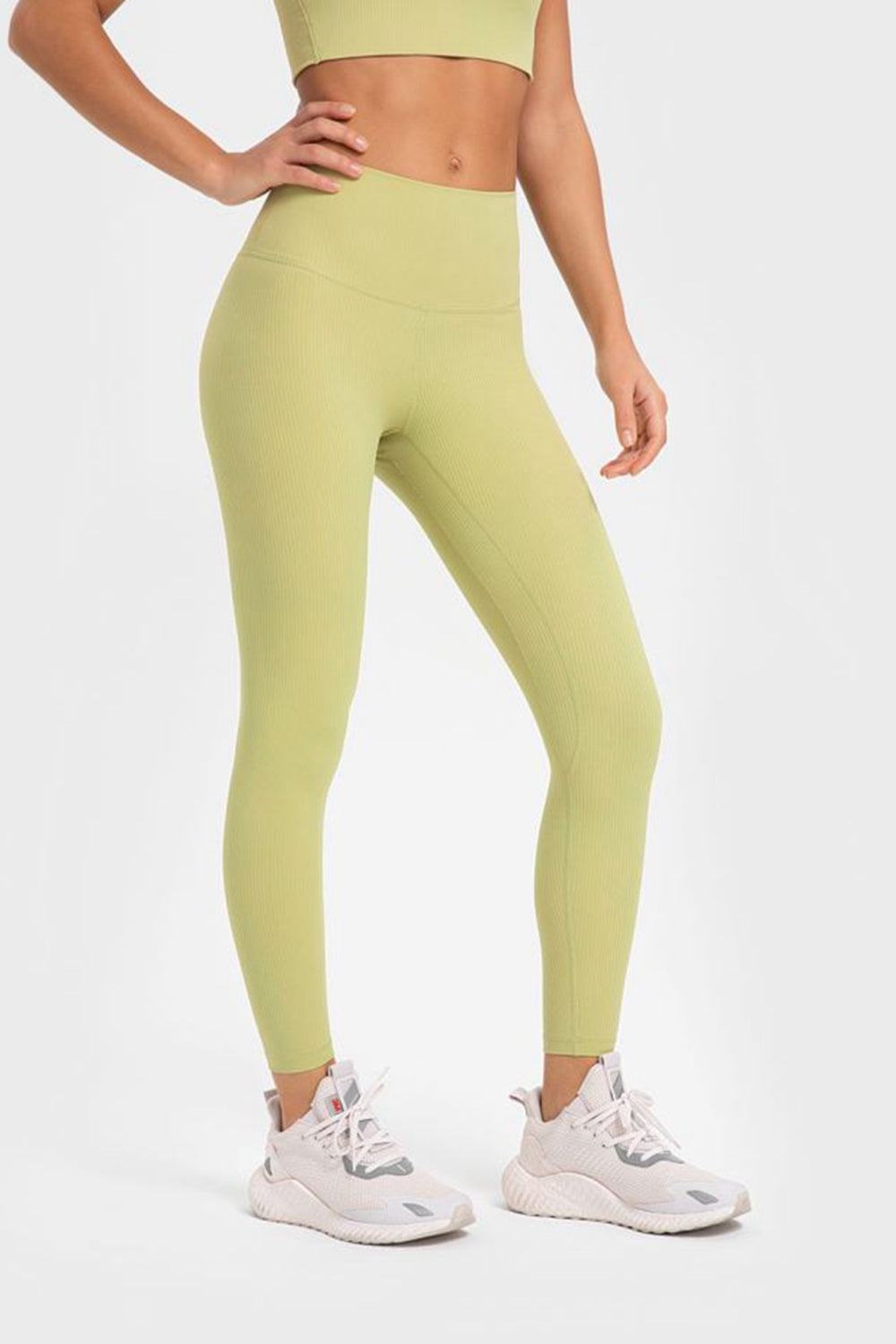 Women’s high-waisted, wide waistband leggings for yoga.