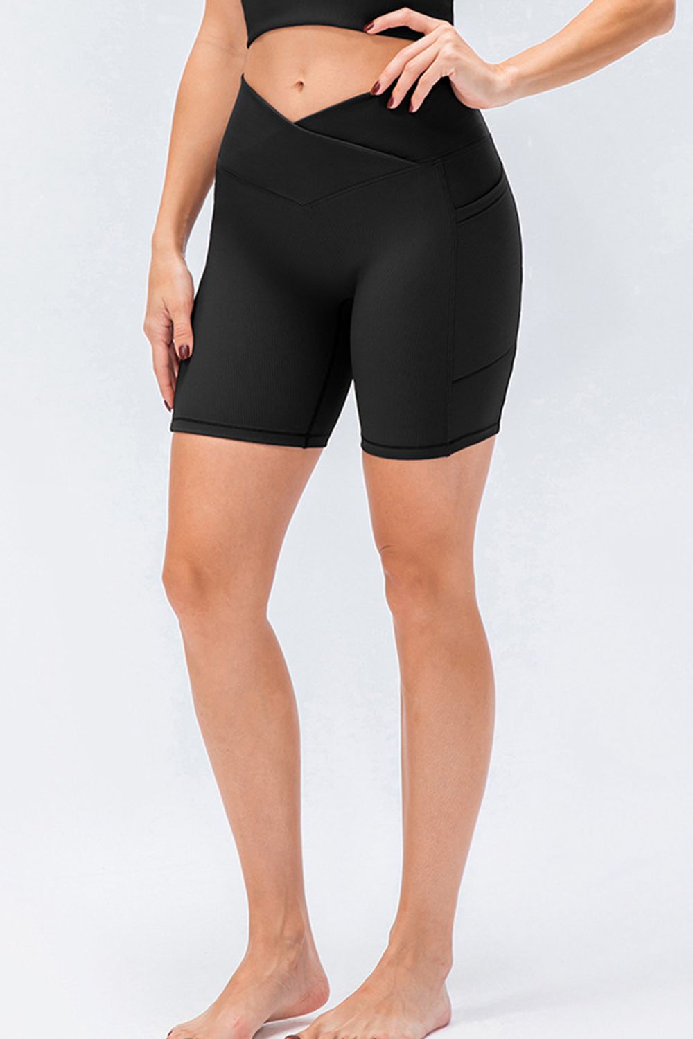 Front view of women’s high-waisted activewear shorts – breathable and stretch-fit design.