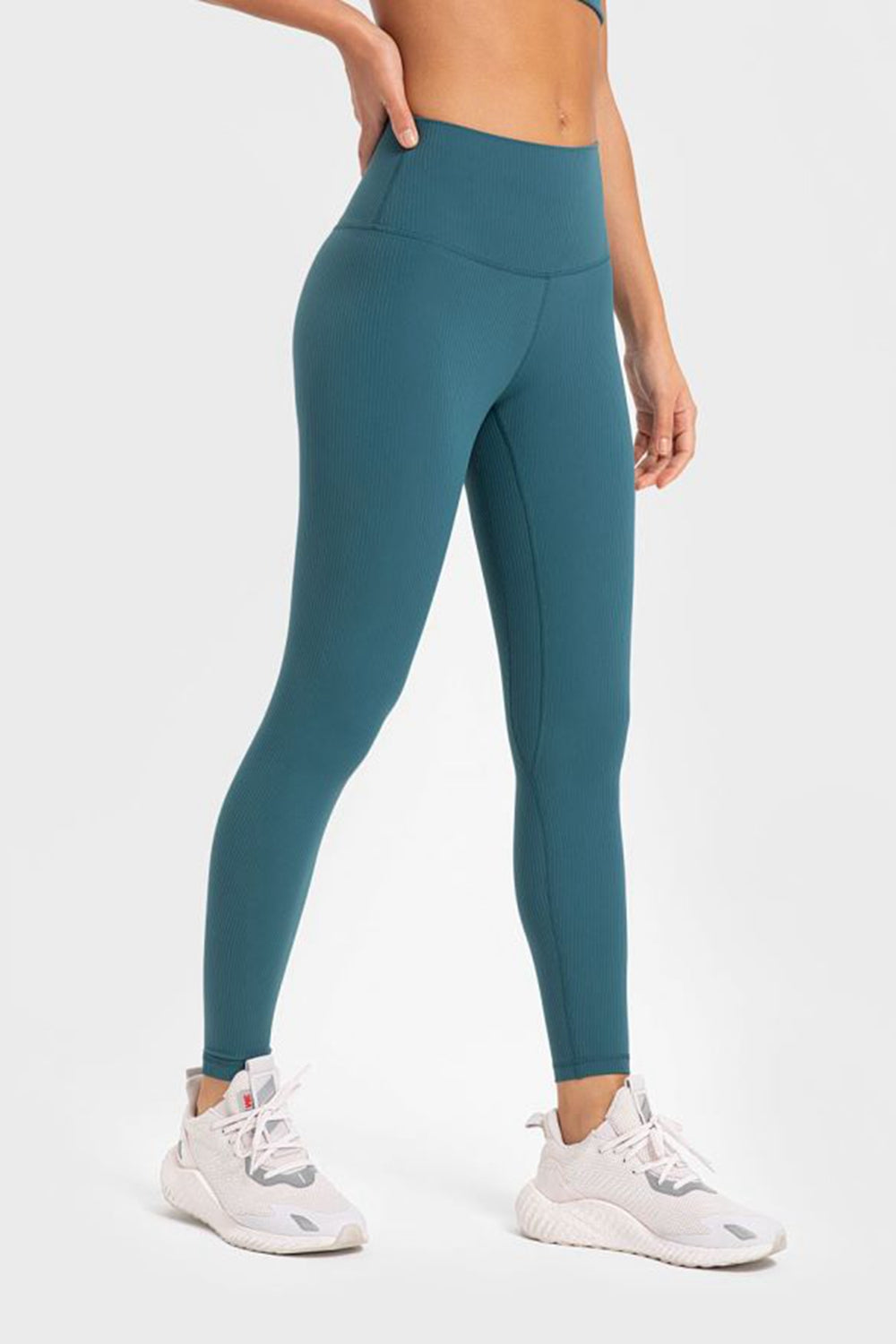 Women’s high-waisted, wide waistband leggings for yoga.