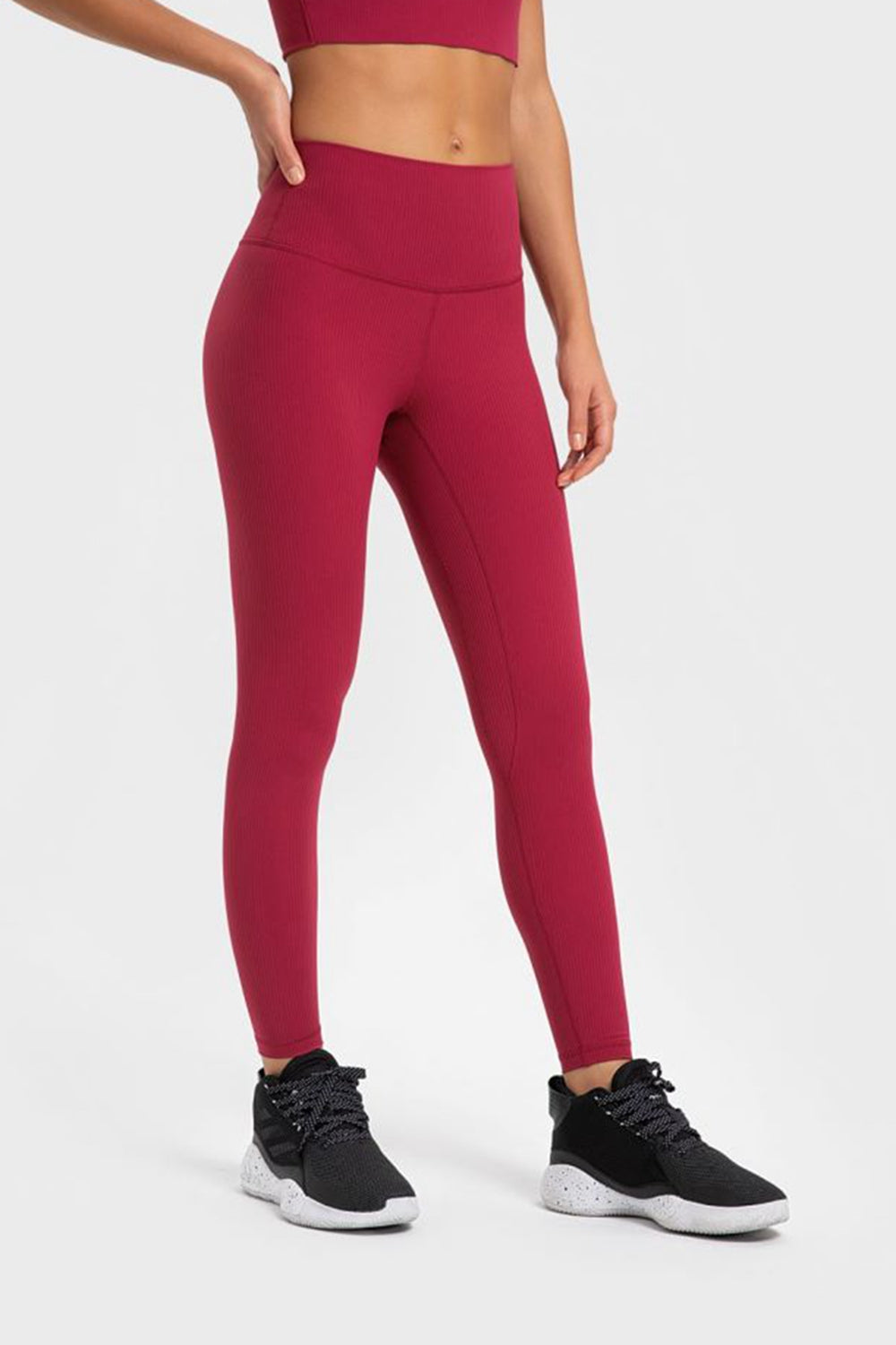 Women’s high-waisted, wide waistband leggings for yoga.