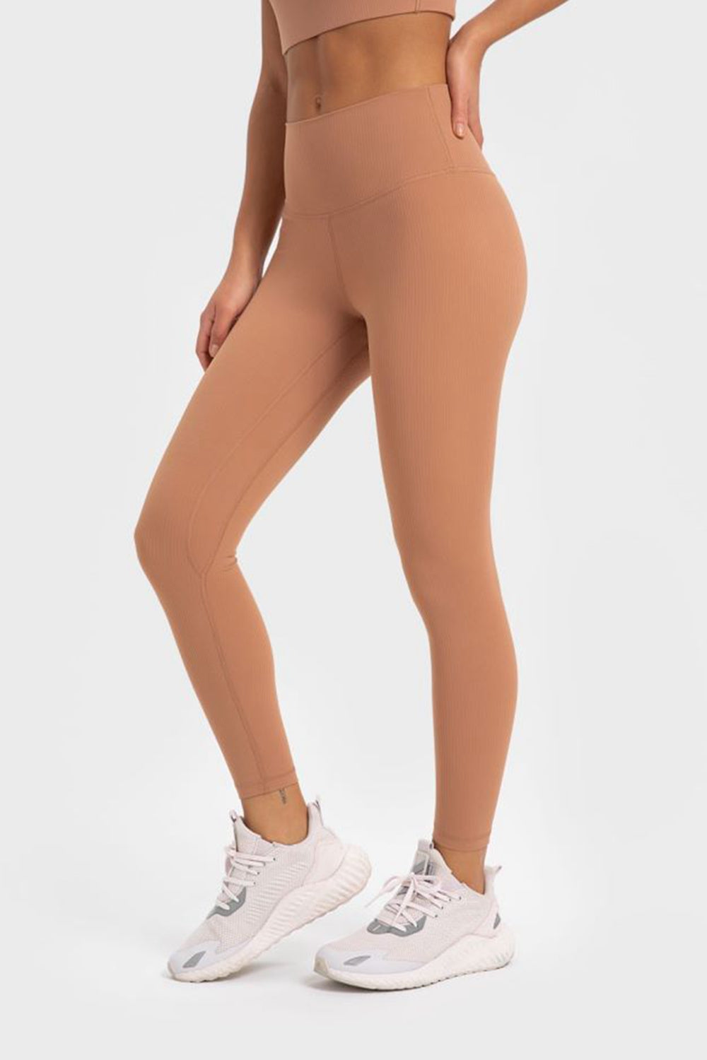 Women’s high-waisted, wide waistband leggings for yoga.