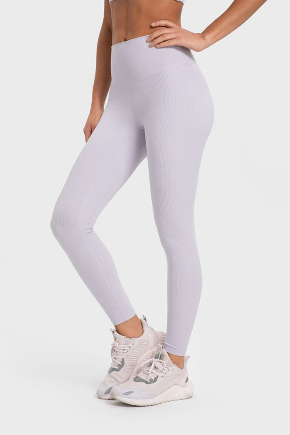 Women’s high-waisted, wide waistband leggings for yoga.