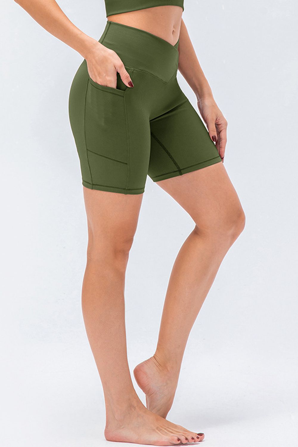 Front view of women’s high-waisted activewear shorts – breathable and stretch-fit design.