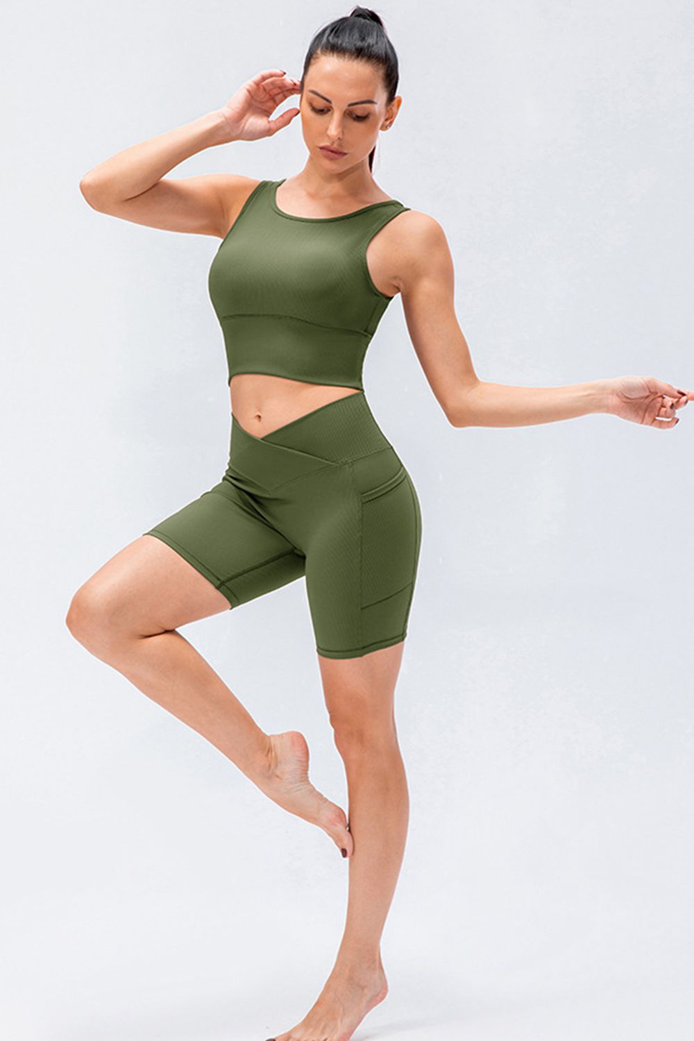 Front view of women’s high-waisted activewear shorts – breathable and stretch-fit design.