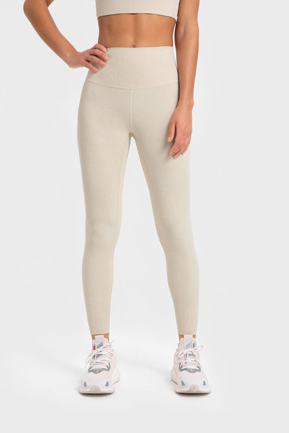 Women’s high-waisted, wide waistband leggings for yoga.