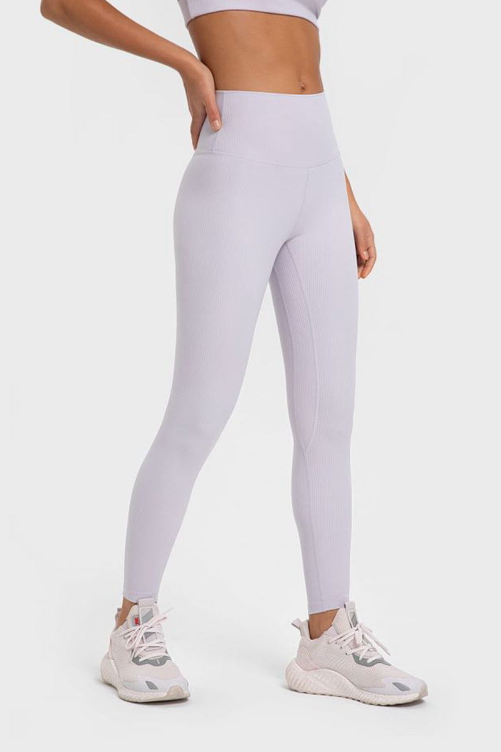 Women’s high-waisted, wide waistband leggings for yoga.